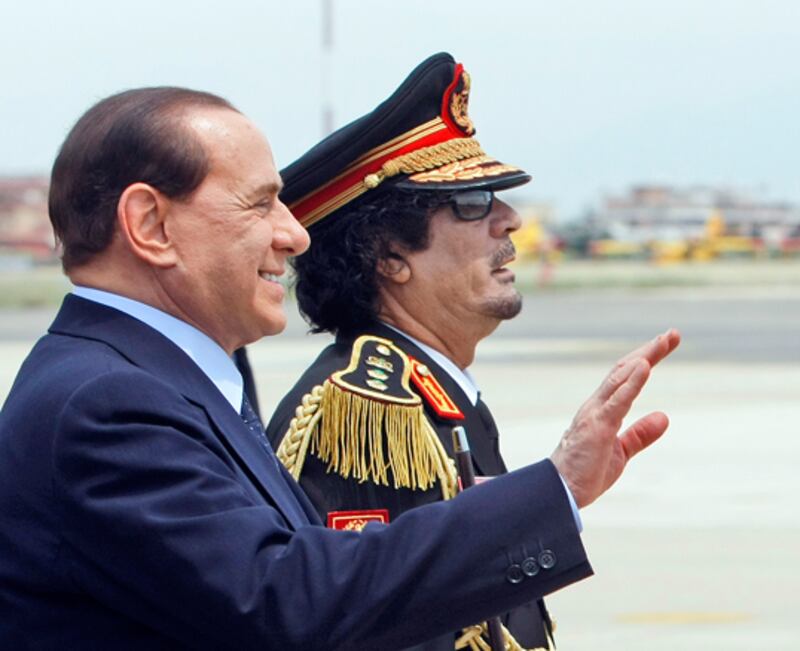 galleries/2011/03/07/gaddafi-or-hotel-doorman/gaddafi-doorman-8-answer_nfulmp