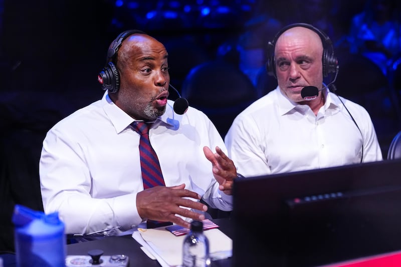 Daniel Cormier and Joe Rogan announce the fights during the UFC Freedom 250 event on the South Lawn at the White House on June 14, 2026 in Washington, DC.