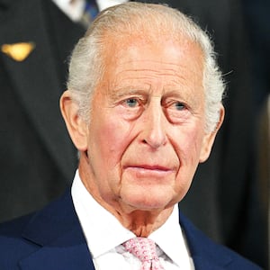 Britain's King Charles III stands for the national anthem during the opening ceremony of the 23rd Commonwealth Games