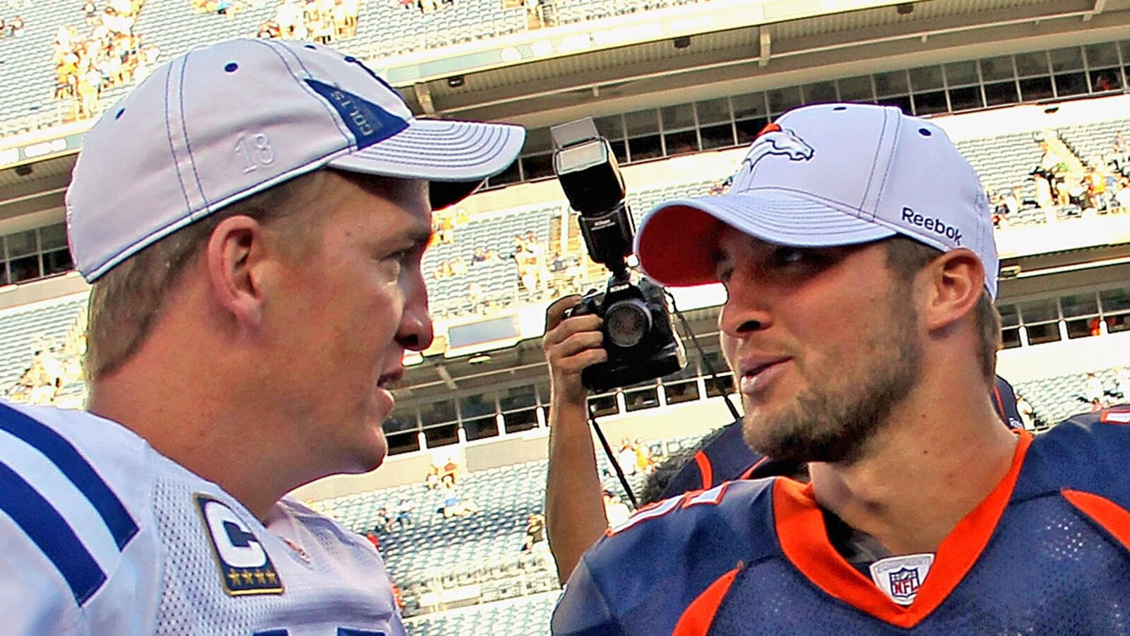 cheats/2012/03/10/manning-faces-tebow/peyton-manning-visits-denver-broncos-tim-tebow-cheat_q9onqw