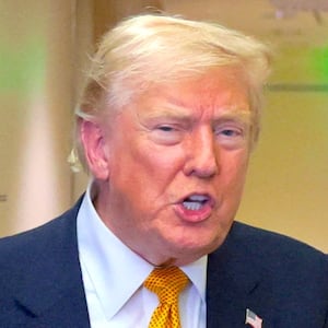 U.S. President Donald Trump speaks to reporters mid-flight in the press cabin of the new, Qatari-gifted Air Force One after changing planes to return to Washington from RAF Mildenhall, Britain, July 8, 2026.