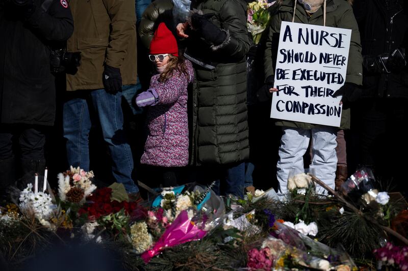 Protesters against Immigration and Customs Enforcement (ICE) march through the streets of downtown Minneapolis, Minnesota, on January 25, 2026.