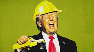 Donald Trump wearing a hard hat and holding a dump truck.