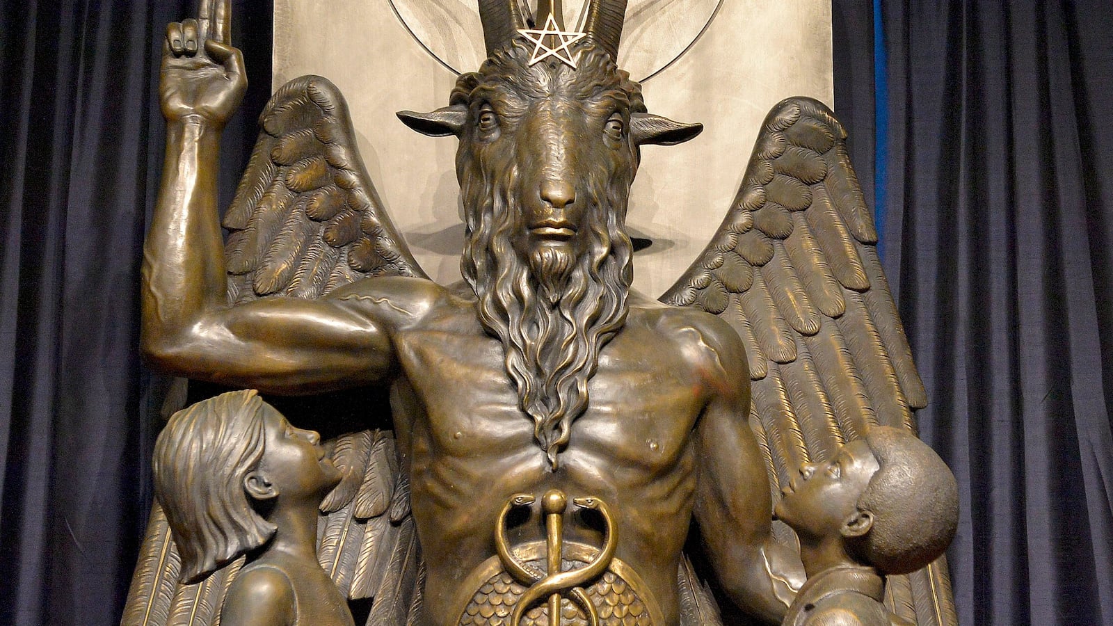 The Baphomet statue is seen in the conversion room at the Satanic Temple where a "Hell House" is being held in Salem, Massachusetts on October 8, 2019.