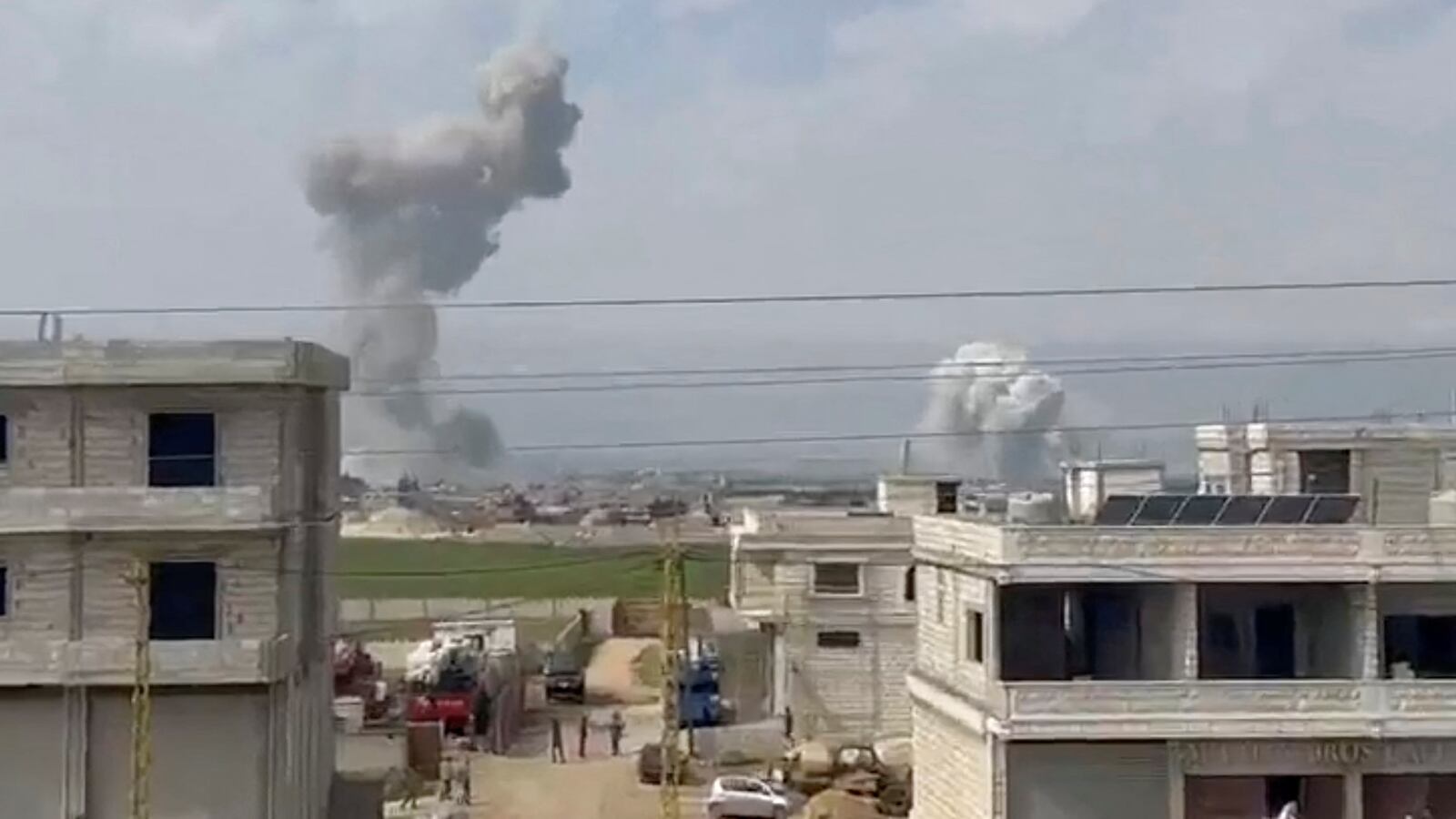 Clouds of smoke rise from Lebanon’s Bekaa Valley, as sources in Lebanon reported Israeli airstrikes killed at least two Hezbollah members.