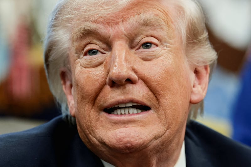 U.S. President Donald Trump reacts during an event with Artemis II astronauts, NASA Commander Reid Wiseman, NASA Pilot Victor Glover, NASA Mission Specialist Christina Koch and Canadian Space Agency (CSA) Mission Specialist Jeremy Hansen, in the Oval Office at the White House in Washington, D.C., U.S., April 29, 2026. REUTERS/Evelyn Hockstein