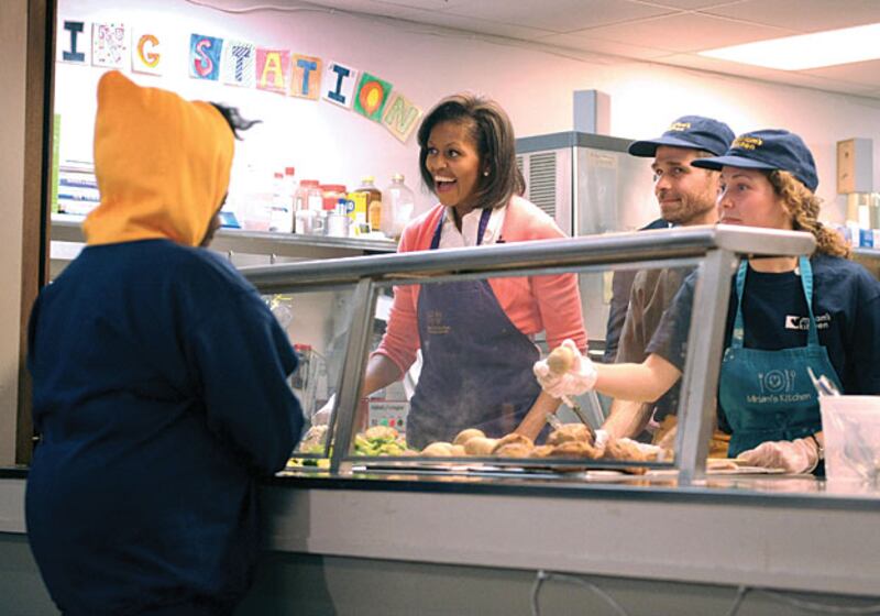 galleries/2009/11/25/a-pictorial-ode-to-michelle-obama/crouch-michelle-obama-4_cqrh91