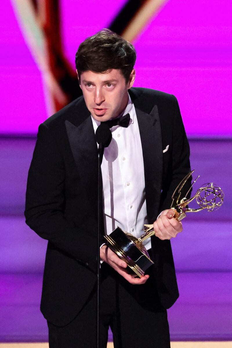 Alex Edelman accepts the Best Outstanding Writing for a Variety Series award for “Just for Us” at the 76th Primetime Emmy Awards in Los Angeles, California, U.S., September 15, 2024. REUTERS/Mario Anzuoni