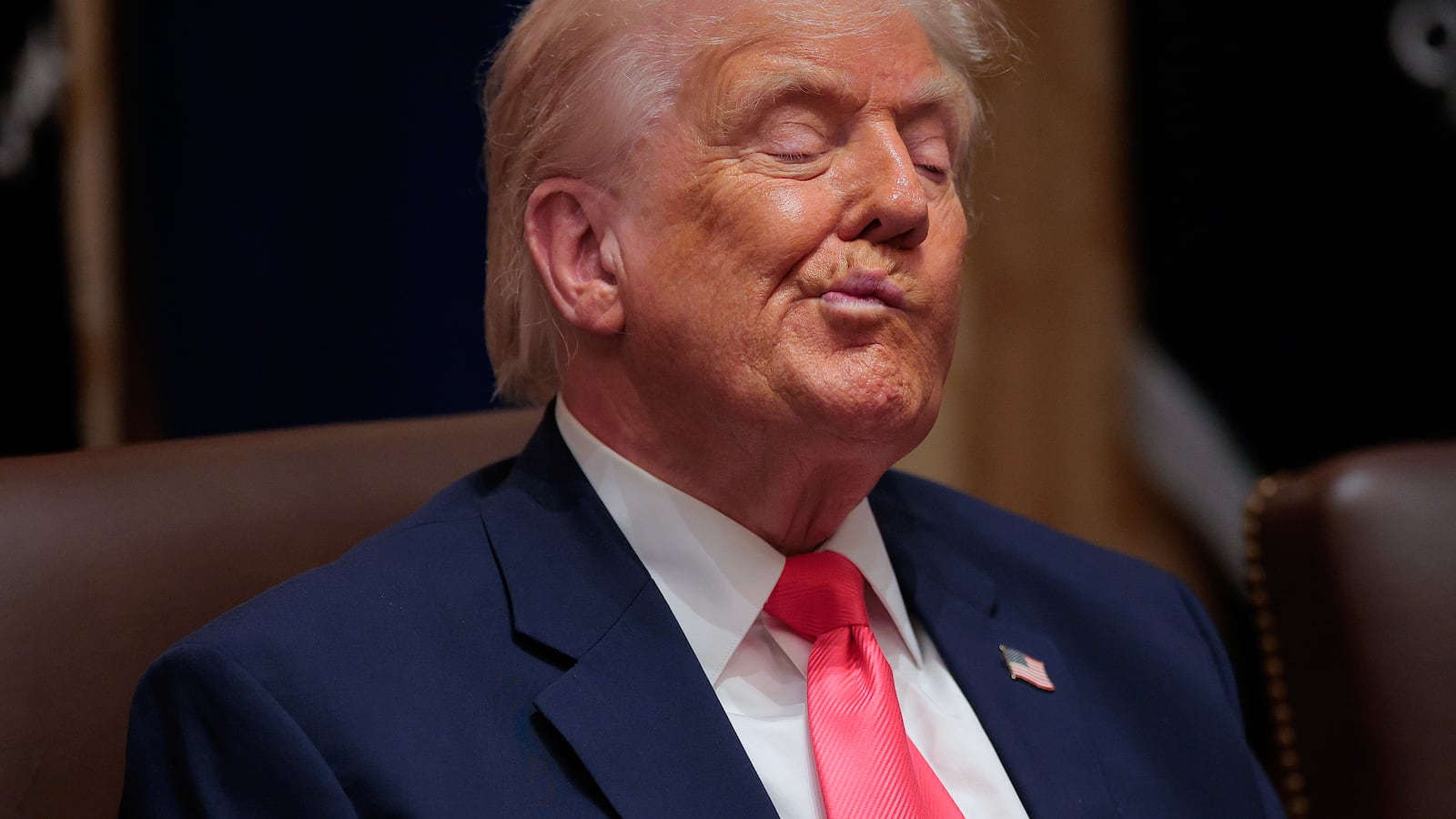 President Donald Trump attends a meeting of his Cabinet in the Cabinet Room of the White House on December 02, 2025 in Washington, DC.