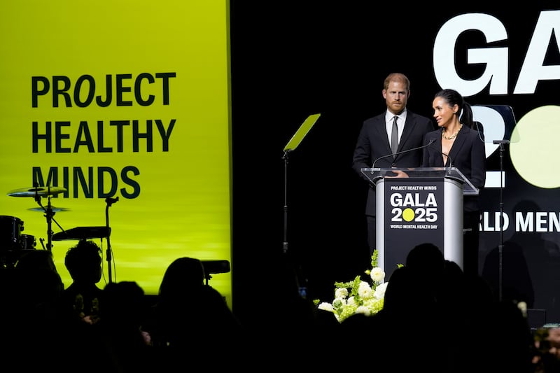 Prince Harry and Meghan Markle speak onstage during the Project Healthy Minds World Mental Health Day Gala at Spring Studios on October 9, 2025 in New York City.