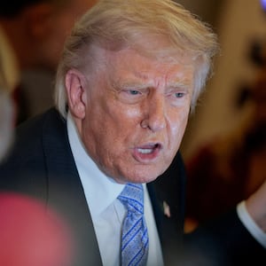 U.S. President Donald Trump speaks to the press aboard Air Force One enroute to the U.S.  following his official visit with President Xi Jinping in China, May 15, 2026. REUTERS/Evan Vucci