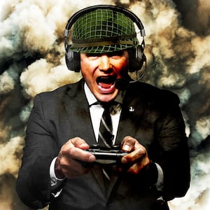 Pete Hegseth wearing a army helmet and a video game headset holding a video game controller, in front of explosions