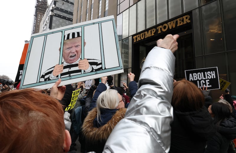 EDITORS NOTE: Graphic content / People gather during a flash-mob in front of Trump Tower on President's Day in New York on February 16, 2026. (Photo by TIMOTHY A. CLARY / AFP via Getty Images)