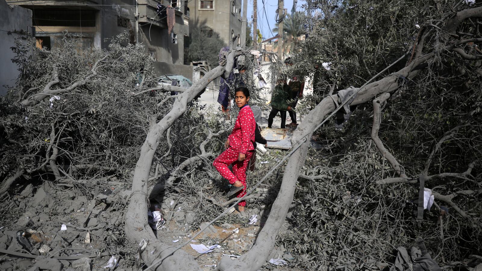 Palestinians are inspecting the damage caused by Israeli bombardment