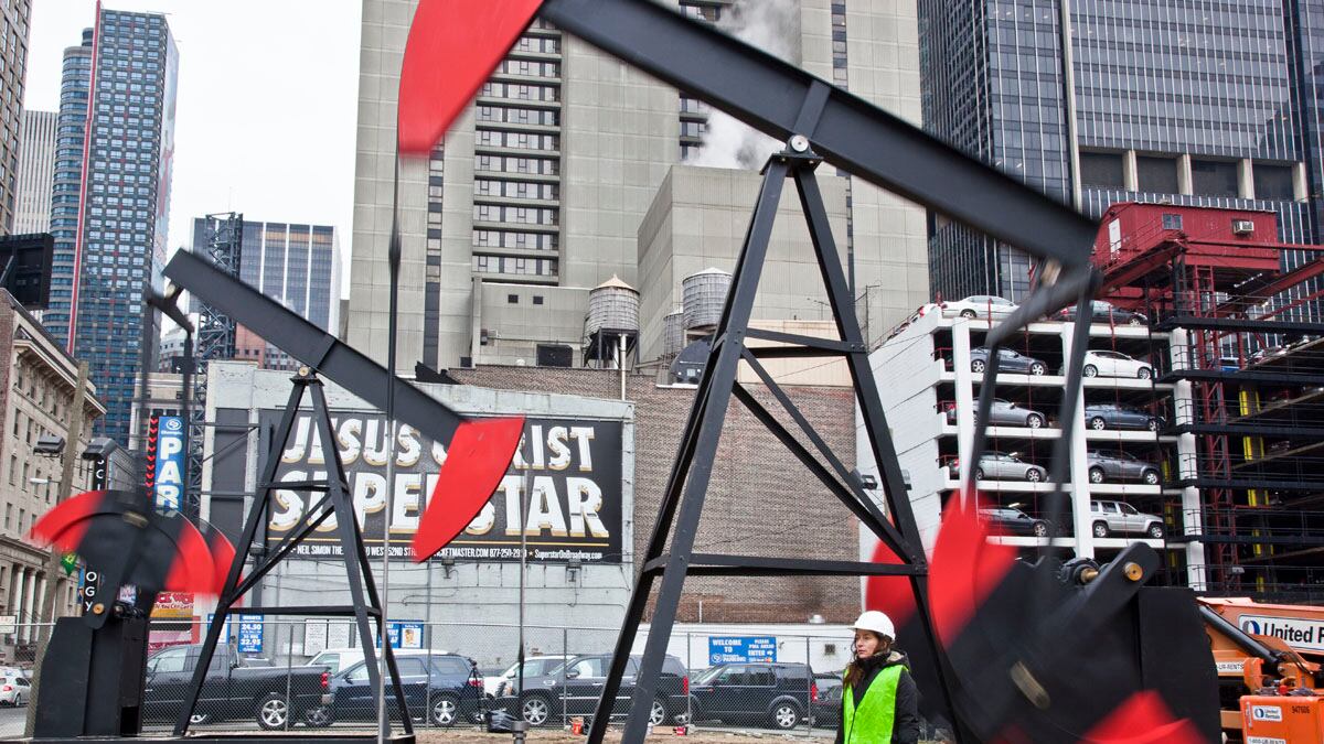 articles/2012/03/04/artist-josephine-meckseper-digs-for-oil-in-times-square-and-strikes-gold/meckseper-oil-gopnik_k803ur