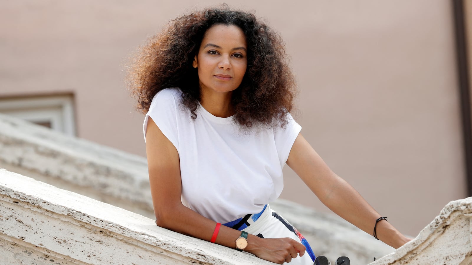 Stella Jean poses along the Spanish Steps.