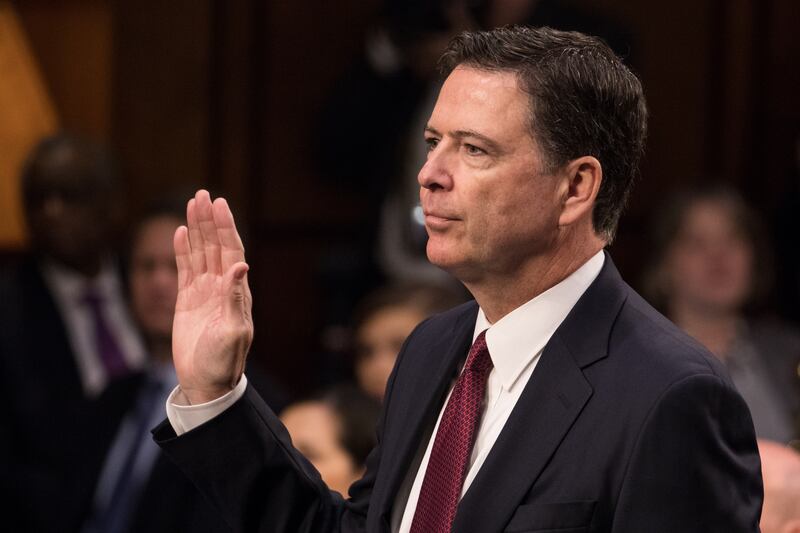 Former FBI Director James Comey was sworn in before he testified in front of the Senate Intelligence Committee, on his past relationship with President Donald Trump, and his role in the Russian interference investigation, in the Senate Hart building on Capitol Hill, on Thursday, June 8, 2017.