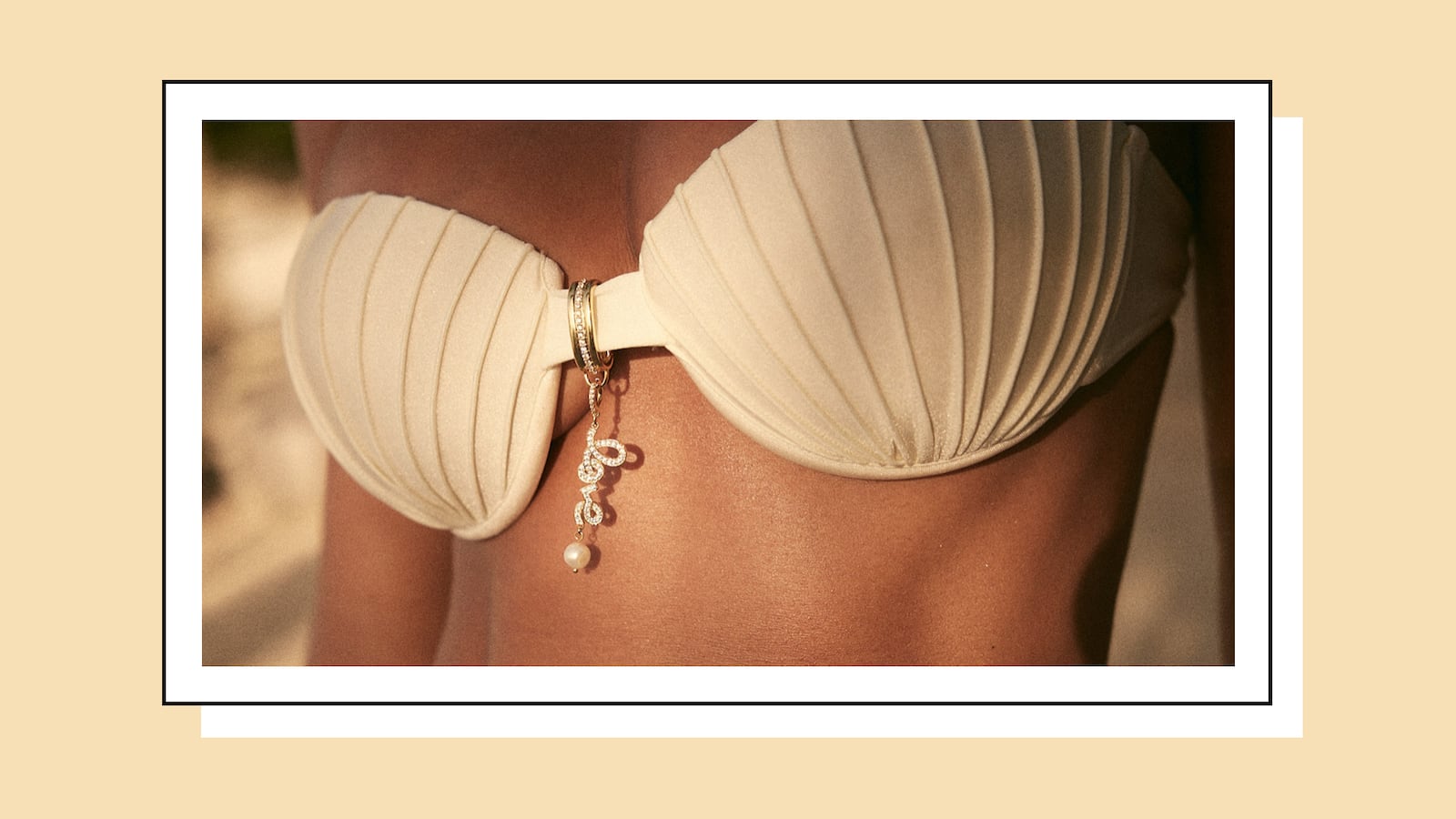Woman wearing Dorne jewelry on her bikini.