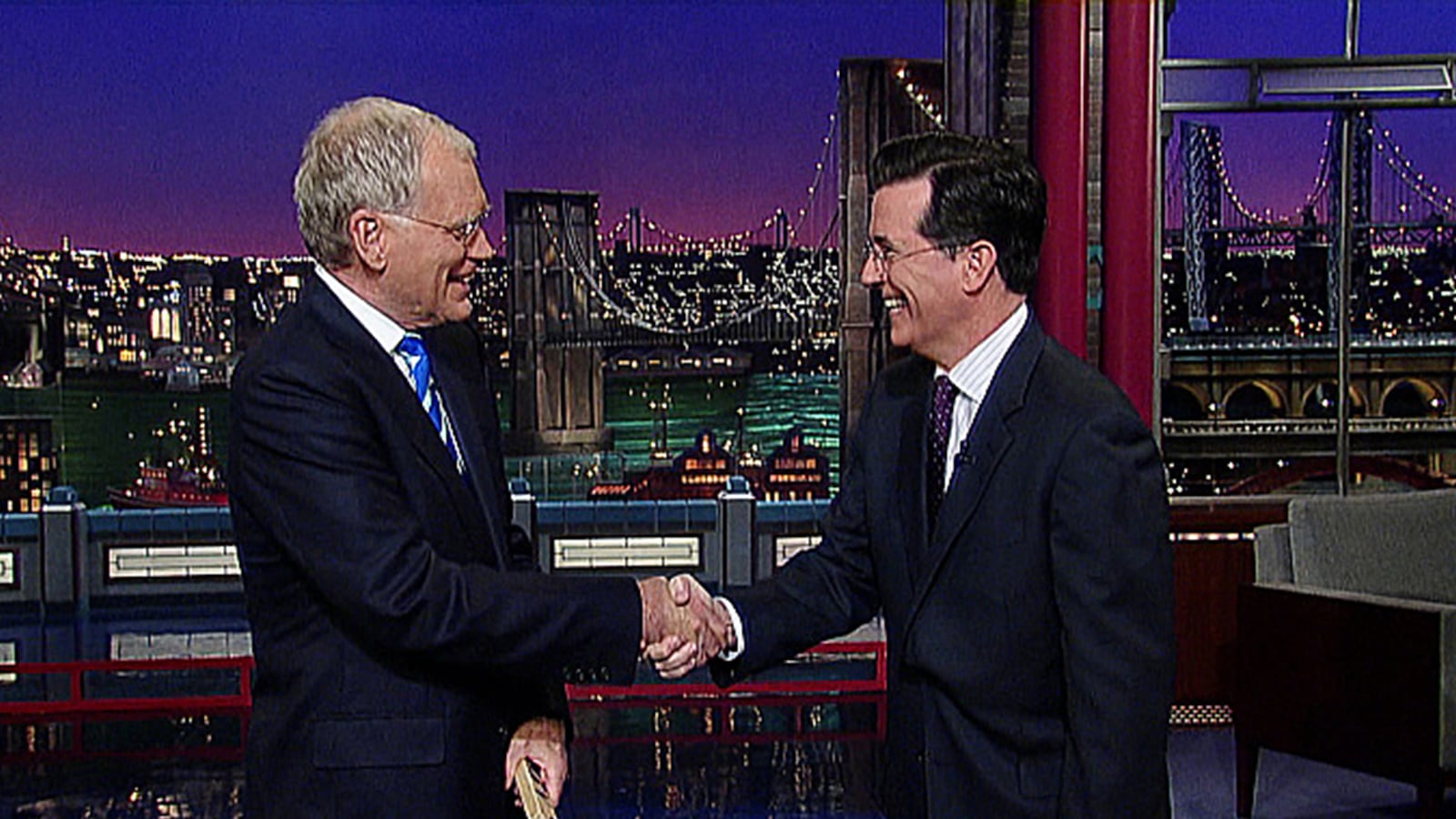 articles/2014/04/10/watch-stephen-colbert-s-first-appearance-on-the-late-show-with-david-letterman/140410-fallon-colbert-letterman_vcsadj