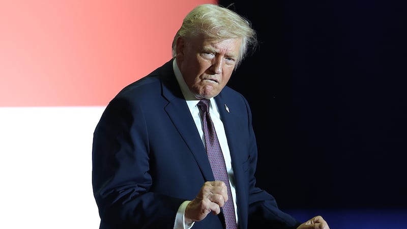 ROCKY MOUNT, NORTH CAROLINA - DECEMBER 19: U.S. President Donald Trump dances on stage during a rally at the Rocky Mount Event Center on December 19, 2025 in Rocky Mount, North Carolina. Trump spoke on his plans to lower the cost of staples, including gas and health care, while blaming the Biden administration for the economic challenges inherited by his administration. (Photo by Tasos Katopodis/Getty Images)