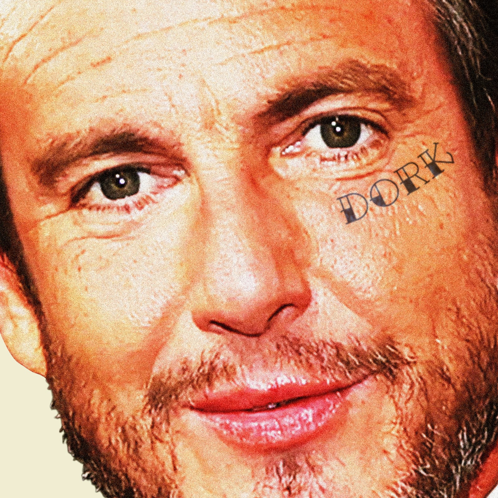 Will Arnett with "dork" tattooed below his eye
