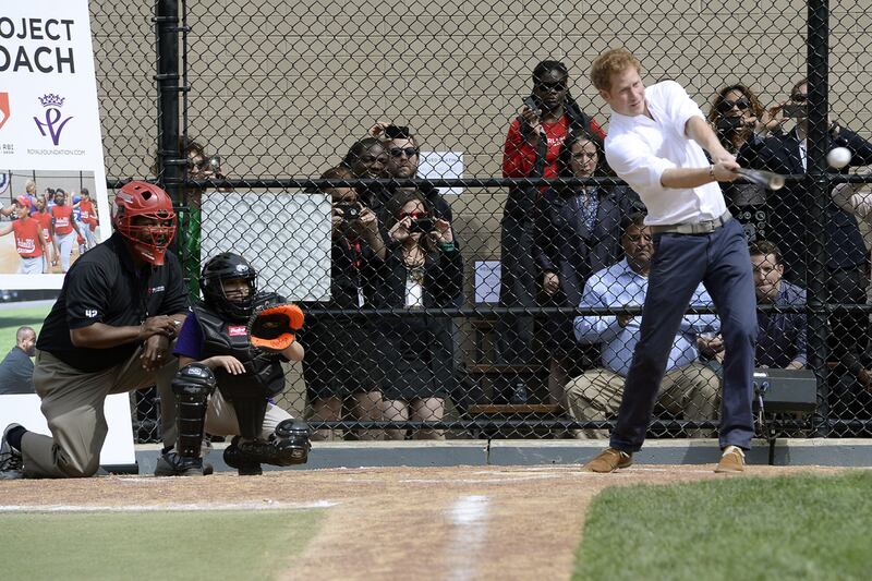 articles/2013/05/09/prince-harry-s-us-tour-rolling-updates-and-all-the-news-and-pictures-as-it-happens/harry-baseball_z7vtja