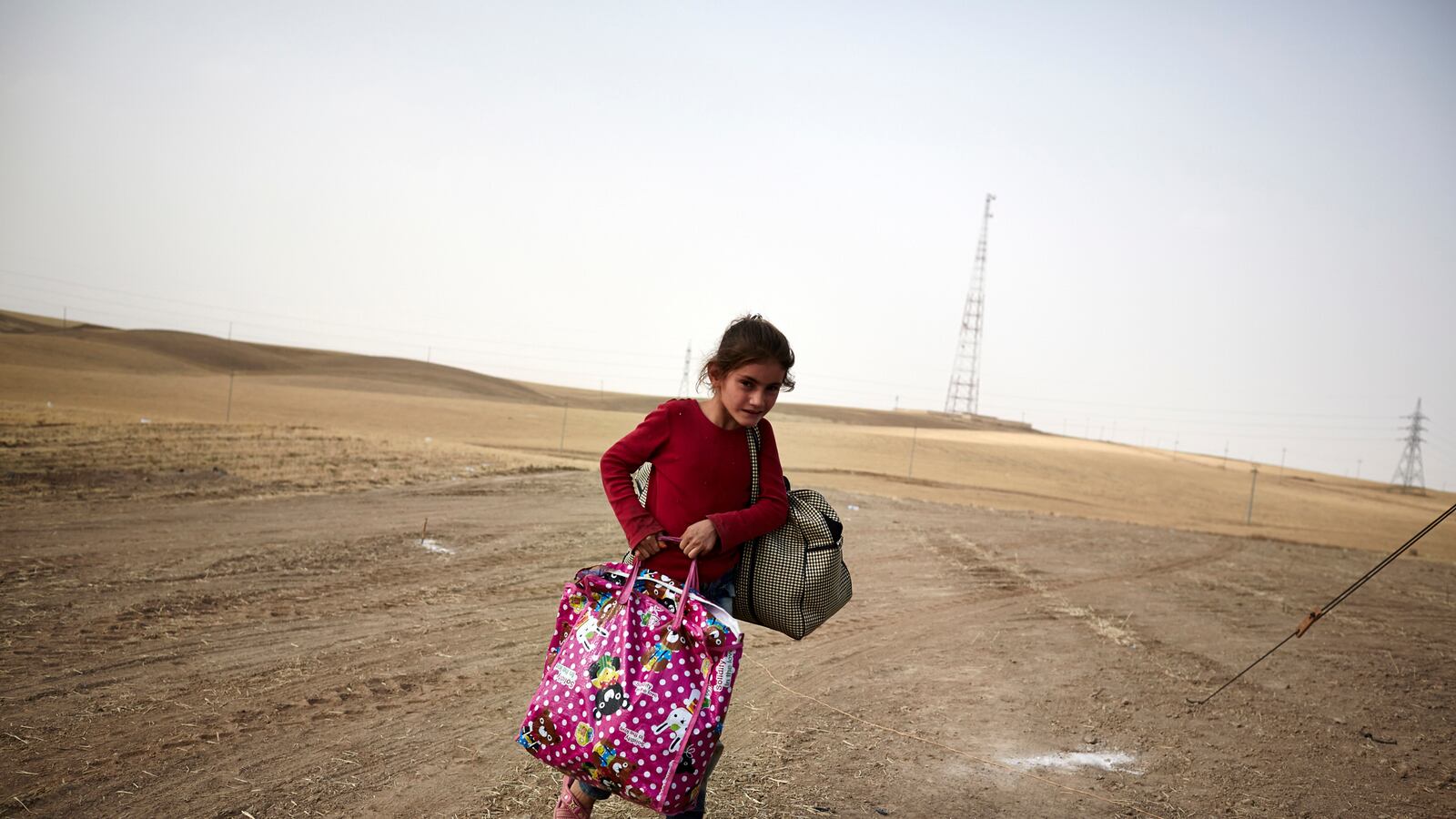 galleries/2014/06/16/thousands-flee-violence-in-iraq-photos/140616-iraq-refugees-1_nf7yqp