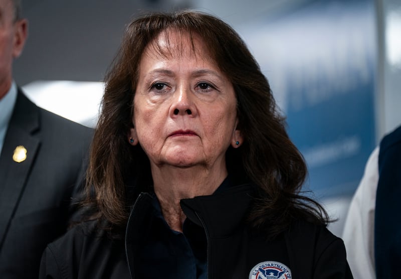 Karen Evans listens during a press conference in the National Response Coordination Center at the Federal Emergency Management Agency