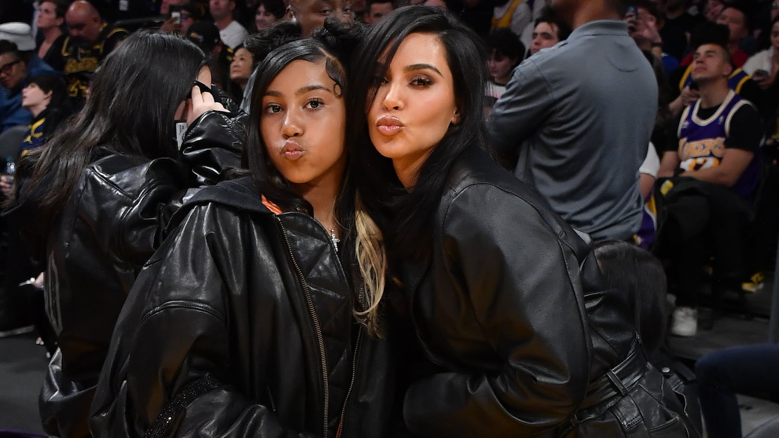 Kim Kardashian (R) and North West in 2024.