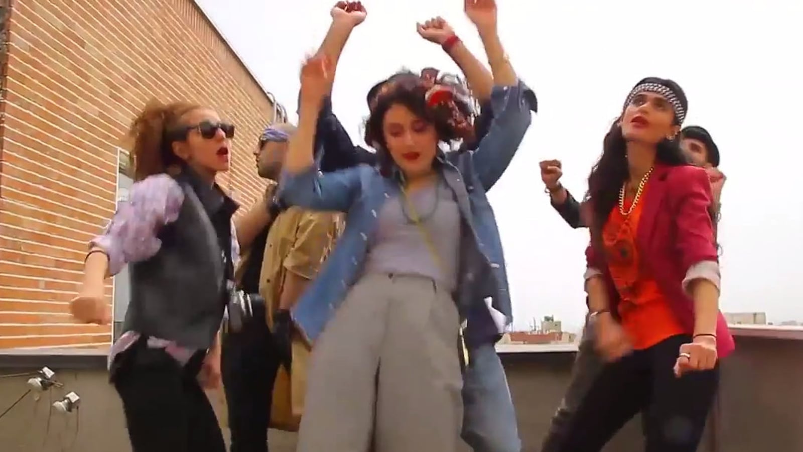 articles/2014/09/17/iran-court-sentences-happy-dancers-to-6-months-and-91-lashes/140917-iranwire-happy-tease_i2jxn8