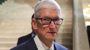 U.S. businessman Tim Cook looks on during the World Economic Forum (WEF) annual meeting in Davos on January 20, 2026.