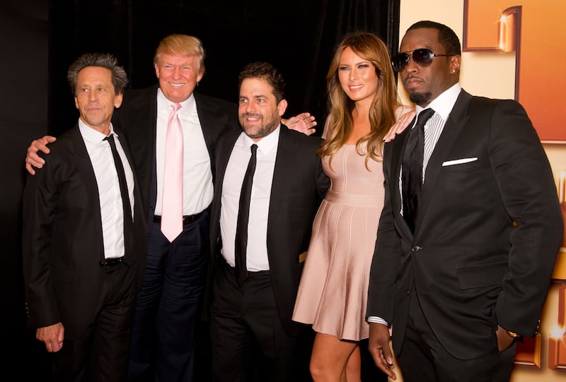 (L-R) Producer Brian Grazer, Donald Trump, director Brett Ratner, Melania Trump and Sean 'Diddy' Combs in 2011.