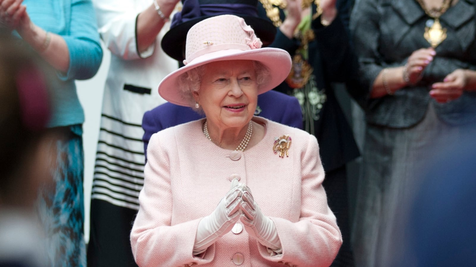 articles/2012/05/16/secrets-of-the-queen-s-gloves/queen-elizabeth-crashes-wedding-cheat_hrtwhz