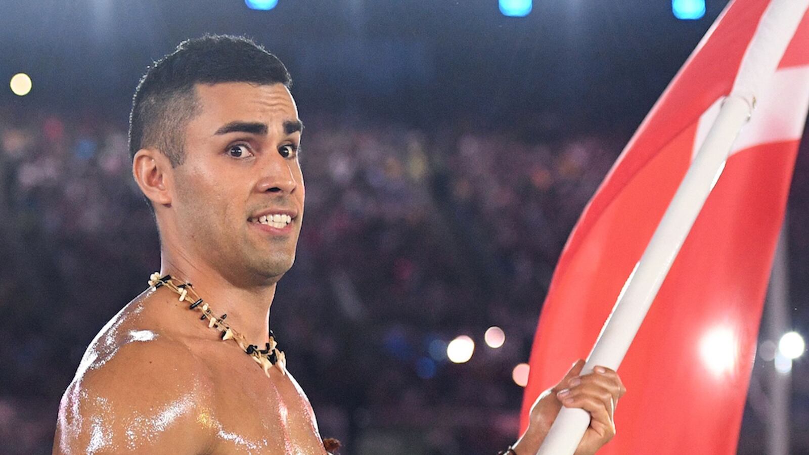 articles/2016/08/06/oily-tonga-flag-bearer-blows-up-twitter/160806-Place-oily-olympics-tonga-man-Tease_hga56i