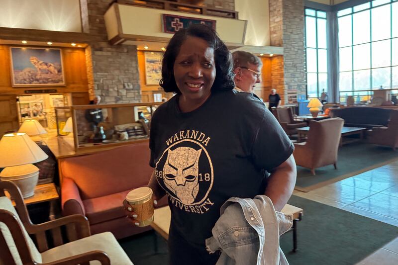 U.S. Federal Reserve Governor Lisa Cook walks in the lobby of Jackson Lake Lodge before the official start of the final day of the Kansas City Fed's annual economic symposium in Jackson Hole, Wyoming, U.S., August 23, 2025. REUTERS/Ann Saphir