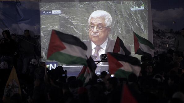 articles/2012/11/30/why-i-supported-the-palestine-u-n-vote/abbas-flags-openz_iw2lub