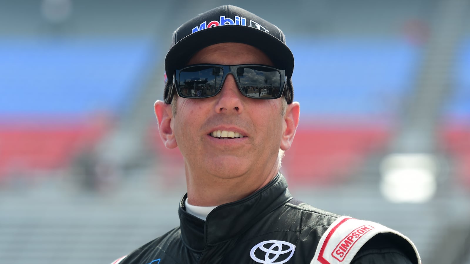 Greg Biffle, driver of the #51 Toyota Toyota, stands on the grid during US Concrete Qualifying Day for the NASCAR Gander Outdoors Truck Series SpeedyCash.com 400 at Texas Motor Speedway on June 07, 2019 in Fort Worth, Texas.