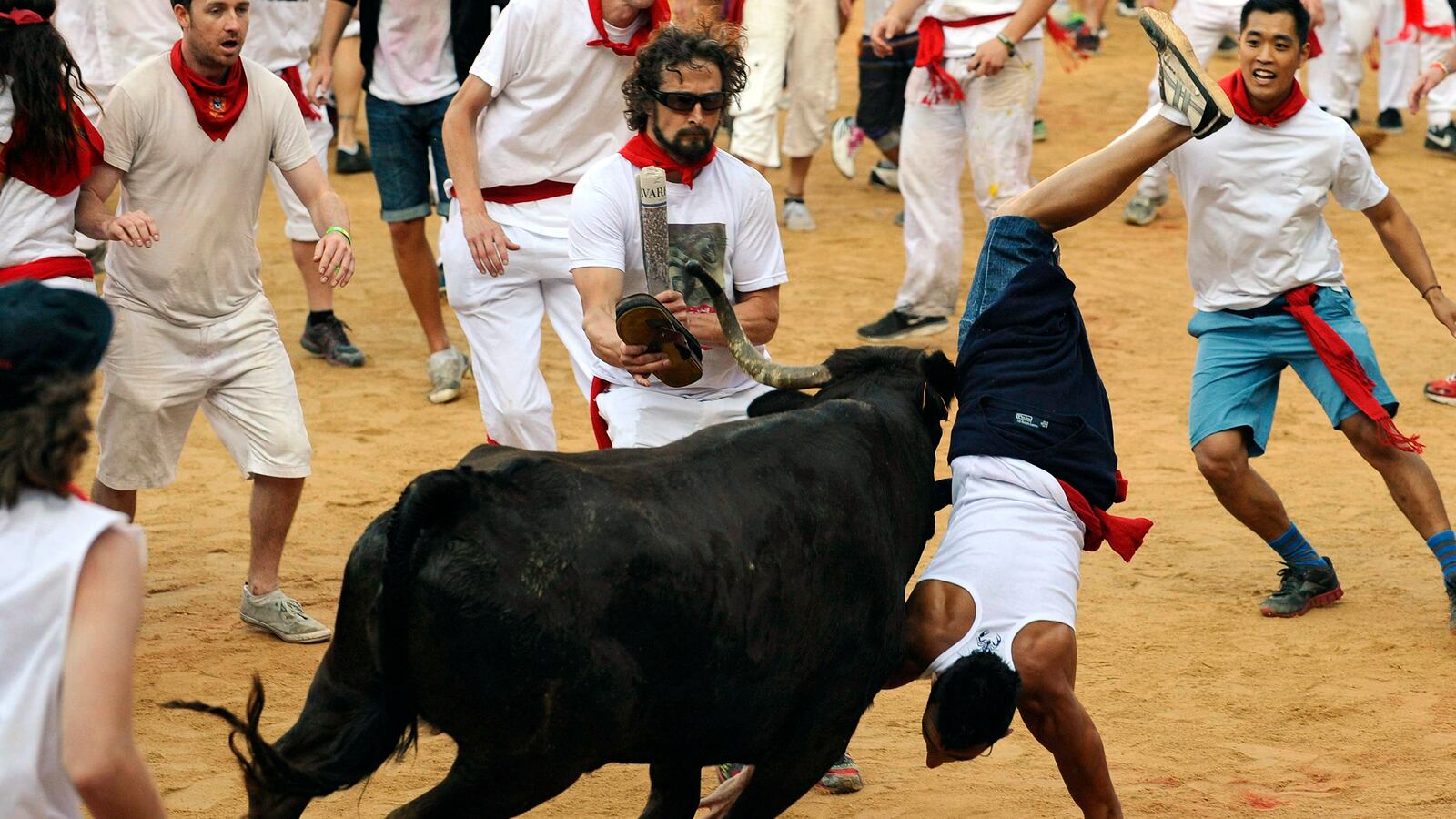 galleries/2013/07/08/the-running-of-the-bulls-in-spain-photos/running-of-the-bulls-tease_phmhmm