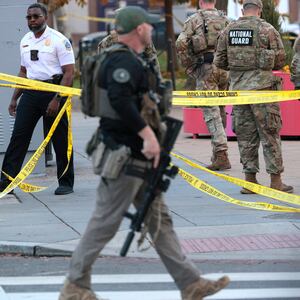 WASHINGTON, DC - NOVEMBER 26: Members of law enforcement and National Guard soldiers respond to a shooting near the White House on November 26, 2025 in Washington, DC. At least two National Guard soldiers have been shot blocks from the White House. (Photo by Chip Somodevilla/Getty Images)