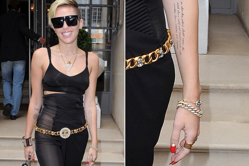 articles/2013/09/28/miley-tattoos-tr-the-inspiration-behind-the-twerker-s-latest-ink/130927-poulos-miley-tatt-tease_gz6ytr