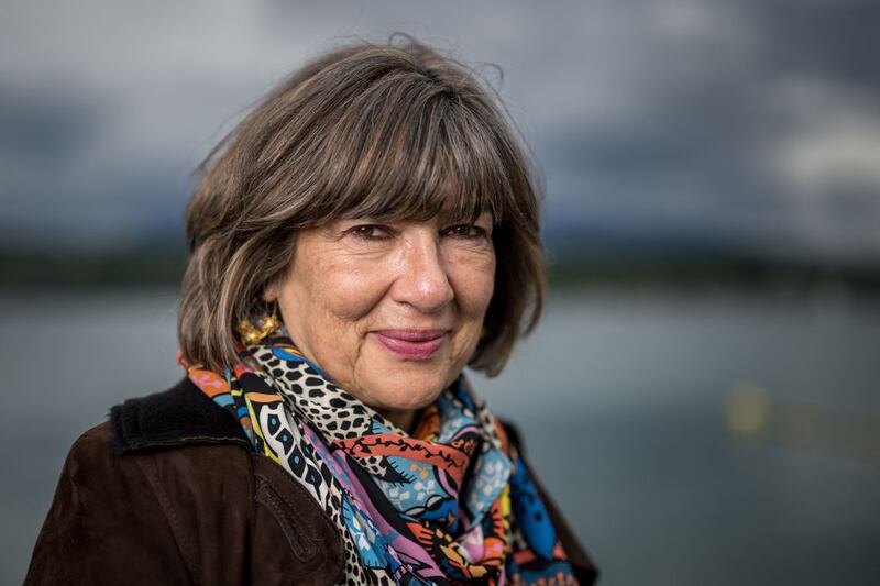 British-Iranian journalist and television host Christiane Amanpour poses for a photograph during the presentation of the exhibition "Dessins pour la liberte" (Cartoons for peace), marking the international press freedom day on the shores of Lake Geneva, in Geneva on May 3, 2024.