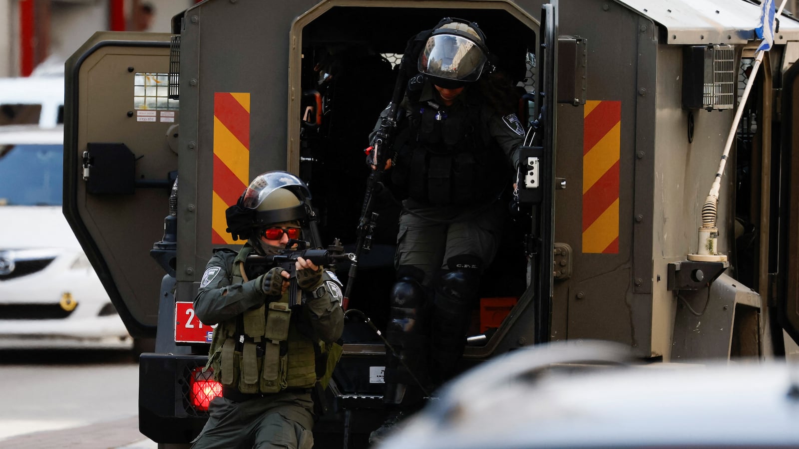 Israeli troops take position as they raid the house of a Palestinian who is believed to be an assailant, in Hebron in the Israeli-occupied West Bank November 16, 2023.
