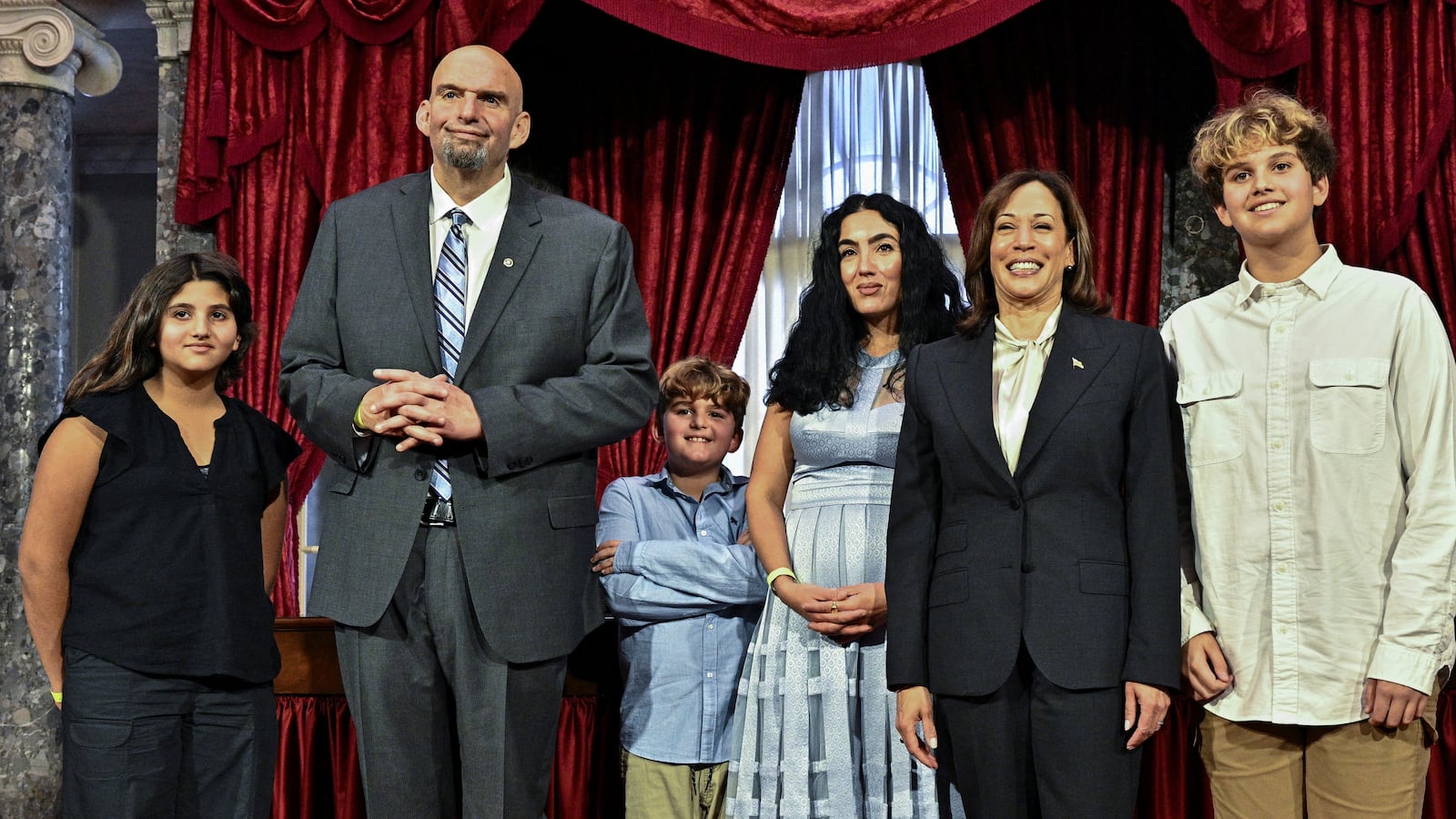 John Fetterman and Gisele Fetterman stand with their children after the 2023 Congressional swearing-in ceremony.