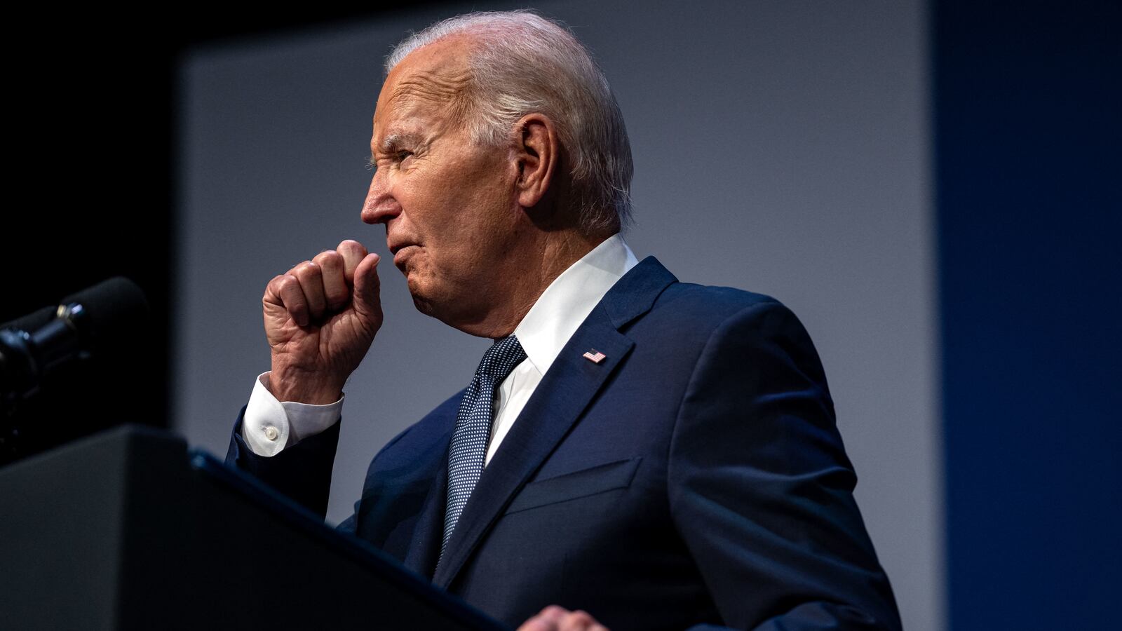 Joe Biden clearing his throat as he speaks on economics during the Vote To Live Properity Summit at the College of Southern Nevada in Las Vegas, Nevada.