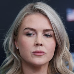 White House Press Secretary Karoline Leavitt listens to a reporter's question during a White House press briefing on November 20, 2025.