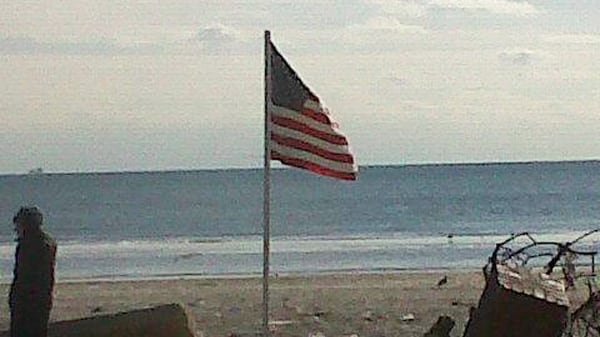 articles/2012/11/06/heroism-in-the-rockaways-after-hurricane-sandy/rockaway-flag-daly_dfpuem