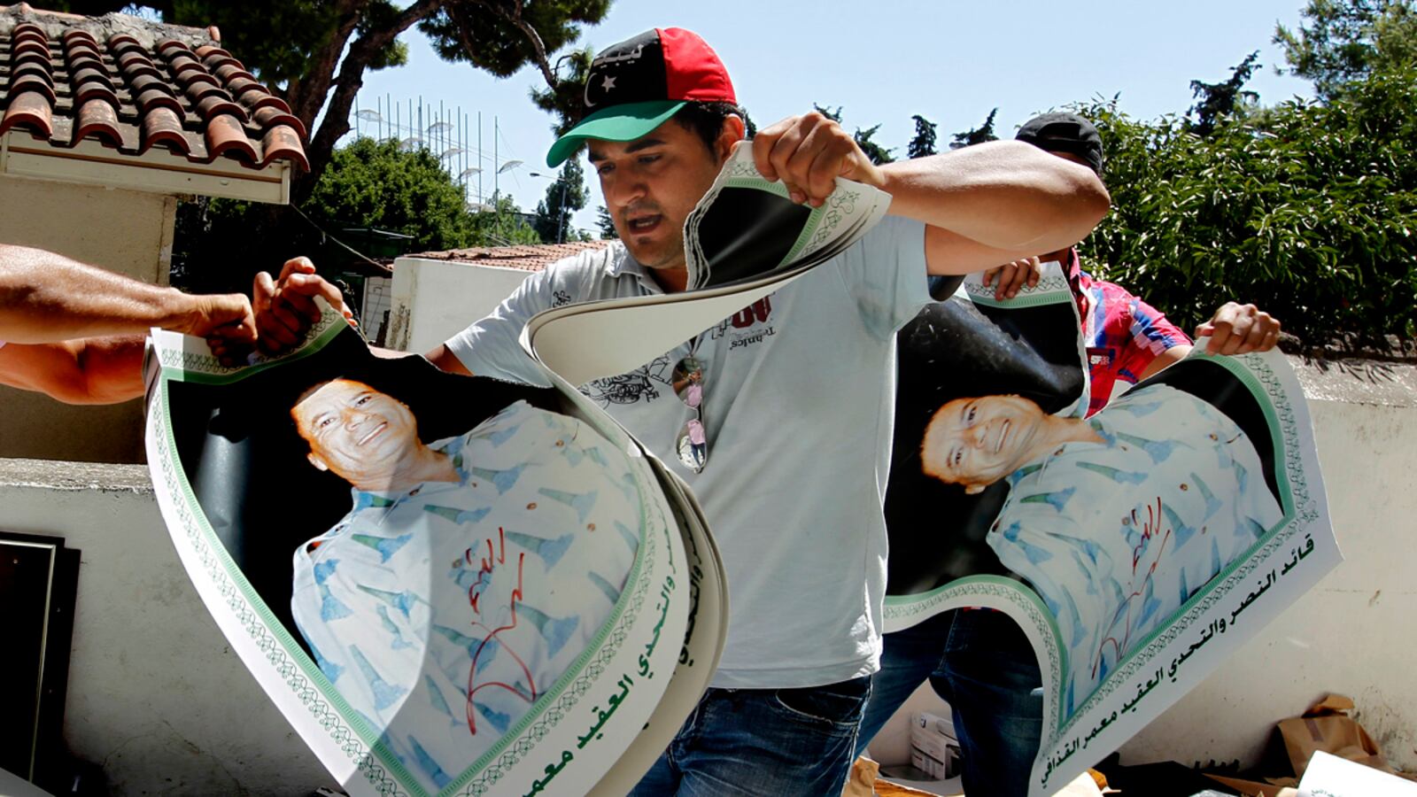 articles/2011/08/23/libya-news-gaddafi-s-defeat-raises-new-questions/gaddafi-fall-carter_ymtce6