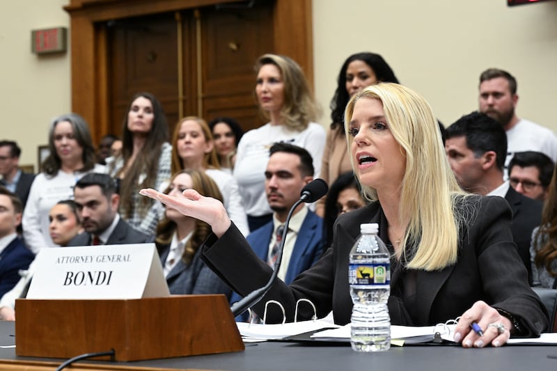 Victims of convicted sex offender Jeffrey Epstein look on as Attorney General Pam Bondi testifies before a House Judiciary Committee on February 11, 2026 where she refused to turn to them and apologize for her Justice Department's botched release of files.
