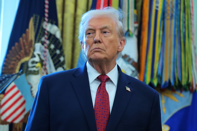 U.S. President Donald Trump listens during a ceremony for the presentation of the Mexican Border Defense Medal.