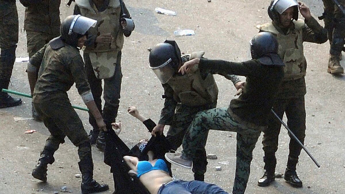 cheats/2011/12/20/egyptian-women-rally-against-police/egypt-protest-female-beatings-cheat_fipyvw